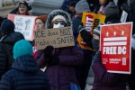 Protestors hold a rally outside of the Wilson building, which houses the office of the Mayor and Council of the District of Columbia, against Immigrations and Customs Enforcement (ICE), in Washington, DC, on January 15, 2026. Photo by Nathan Posner/Anadolu via Getty Images.