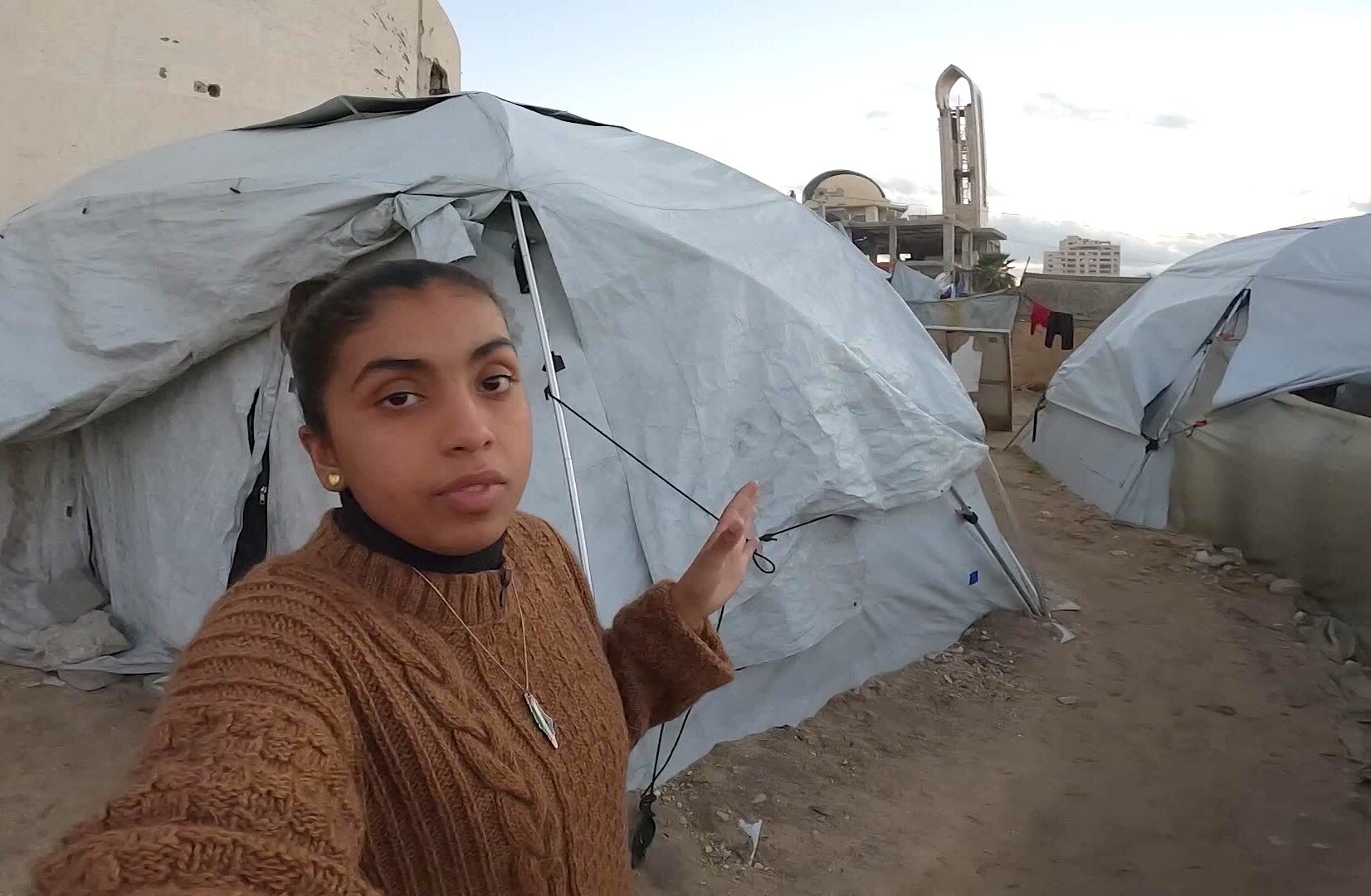 ‘Let me show you’: Survivors cling to life in Gaza’s tent cities